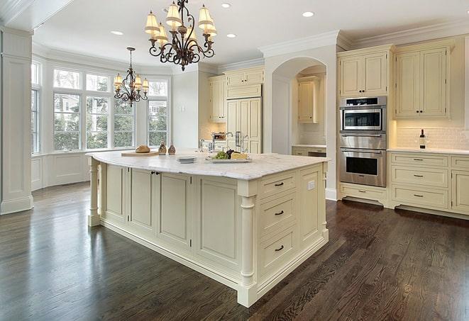 stylish bedroom with laminate floors in Genesee